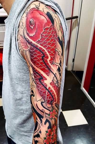 Red Dragon Fish Tattoo On Man Left Sleeve