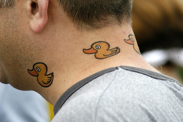 Rubber Duck Tattoos On Man Neck