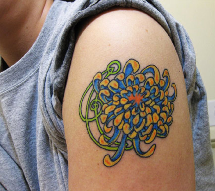Small Blue Chrysanthemum Tattoo On Left Shoulder