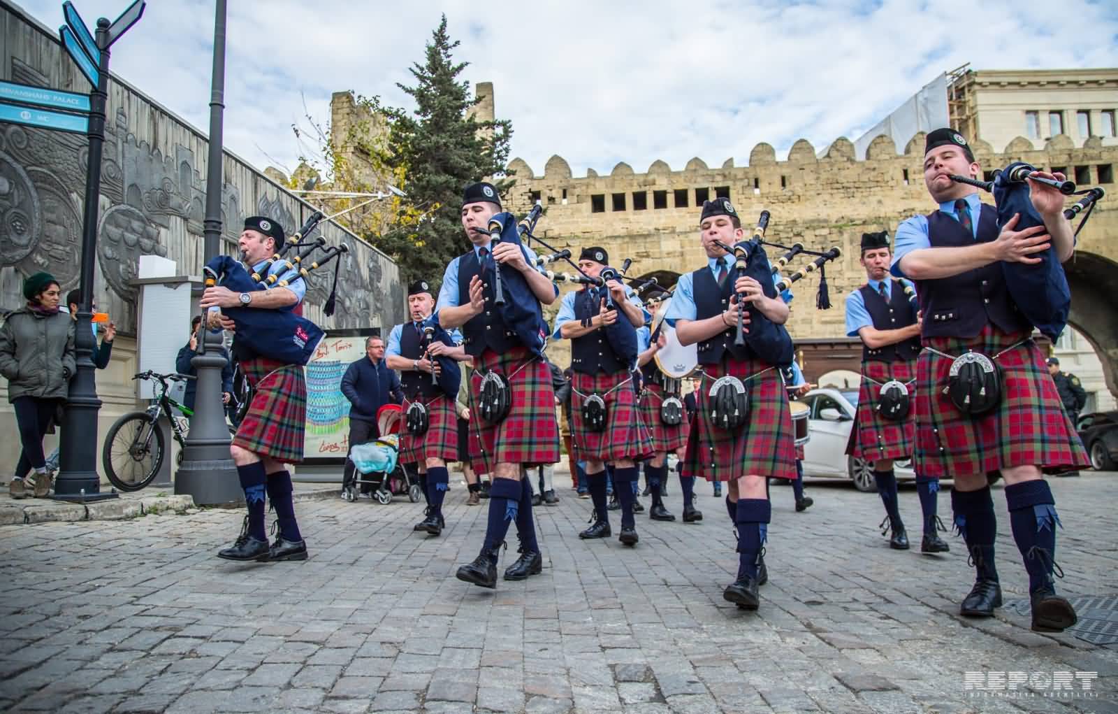 The Parade Of Scottish Pipers Group During St. Andrew's Day Celebration