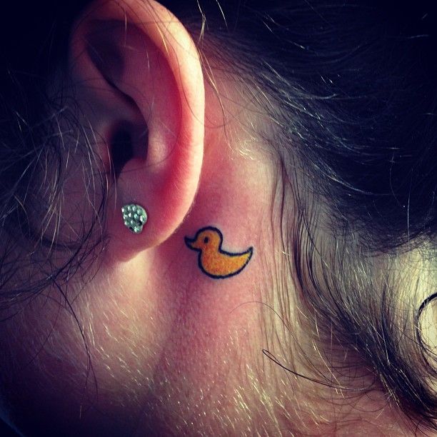 Tiny Rubber Duck Tattoo Behind The Ear