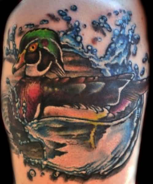 Wooden Duck Tattoo On Left Shoulder
