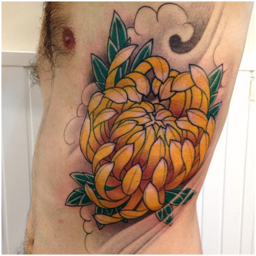 Yellow Chrysanthemum Tattoo On Man Side Rib