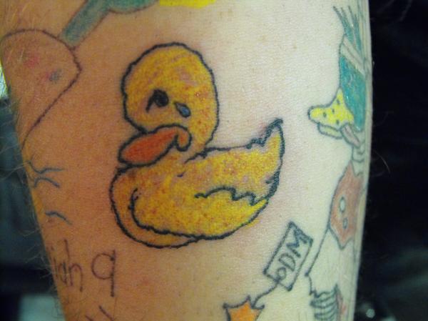 Yellow ink Duck Tattoo