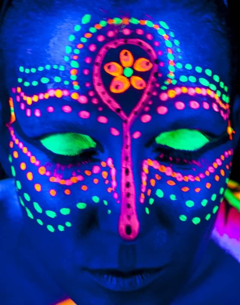 Awesome Uv Rays Colorful Tattoo On Face