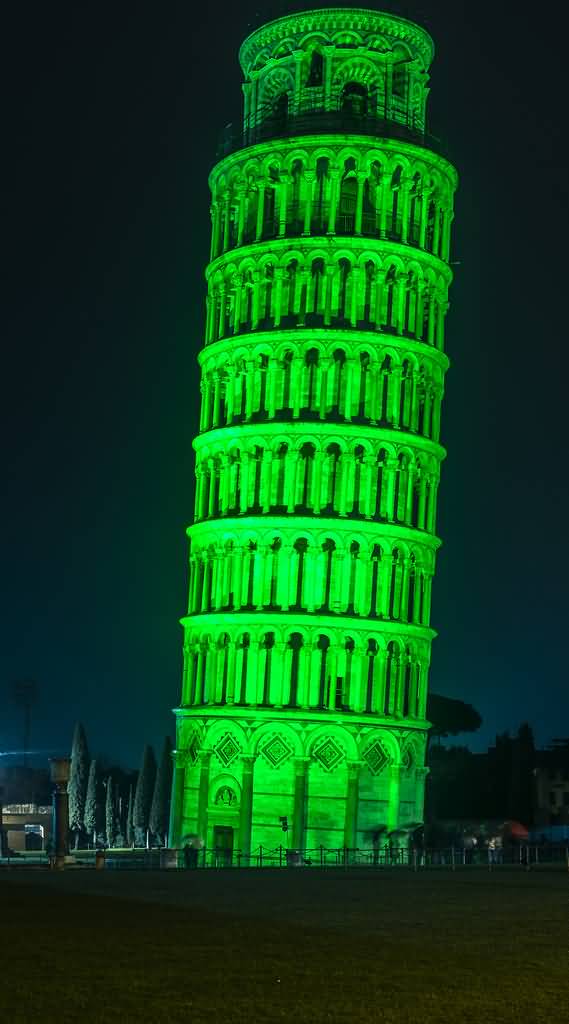 Beautiful Green Light Decoration Of Leaning Tower Of Pisa At Night During St. Patrick's Day Celebration