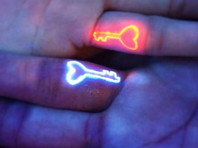 Black Light Key Tattoos On Fingers