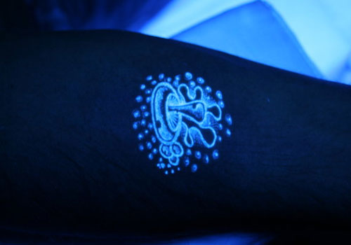 Black Light Mushroom Tattoo On Arm