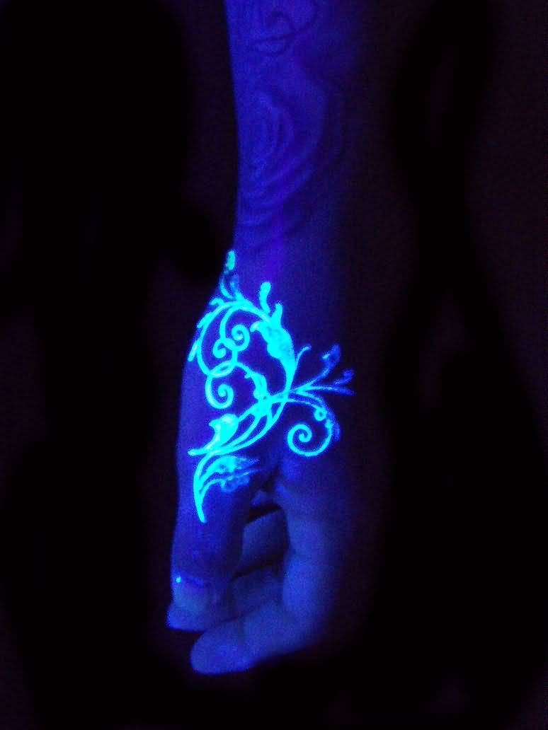 Black Light Swirl Tattoo On Left Hand by Hatefulss