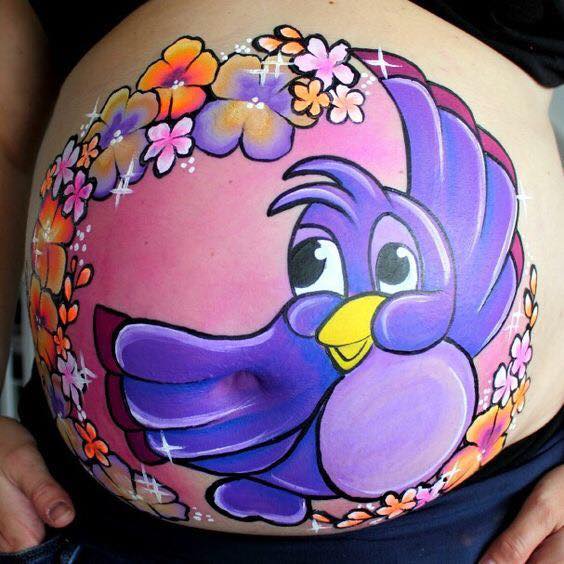 Colored Flowers And Open Wings Bird Pregnancy Tattoo