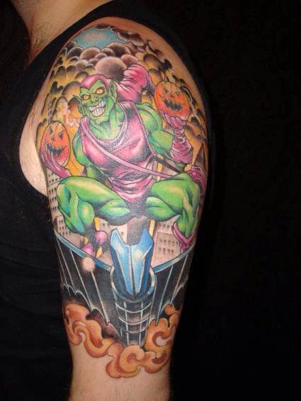 Colored Goblin Tattoo On Man Left Half Sleeve