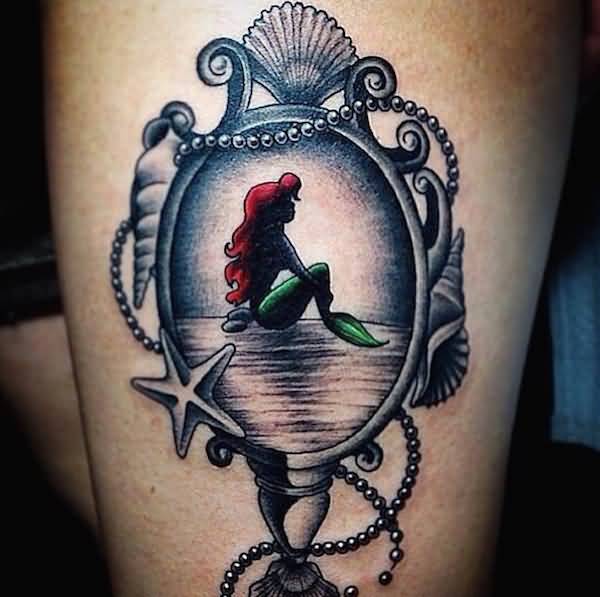 Disney Mermaid In Mirror Frame Tattoo On Thigh