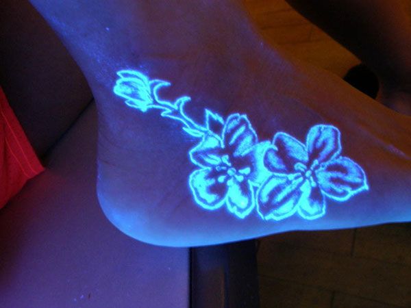 Flowers Black Light Tattoo On Ankle