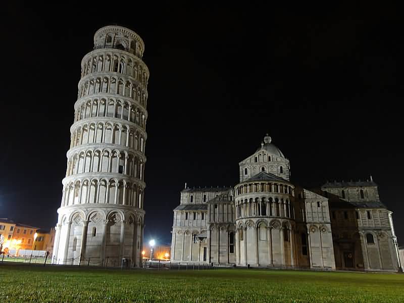 Front View Of St. Mary Cathedral And Leaning Tower Of Pisa At Night