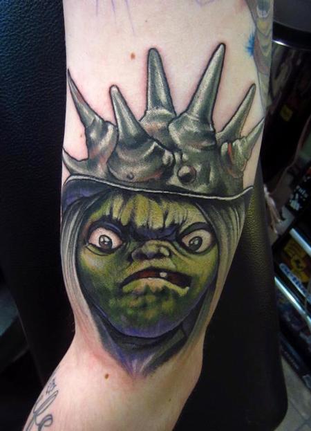 Green Ink Goblin Tattoo On Left Bicep