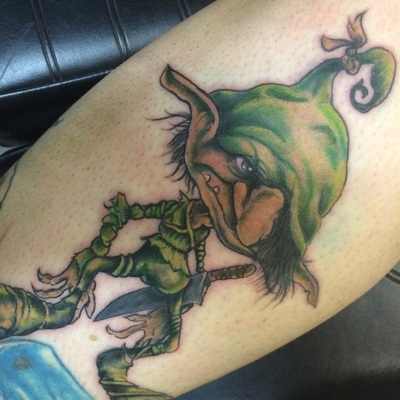 Green Ink Old Goblin Tattoo On Leg