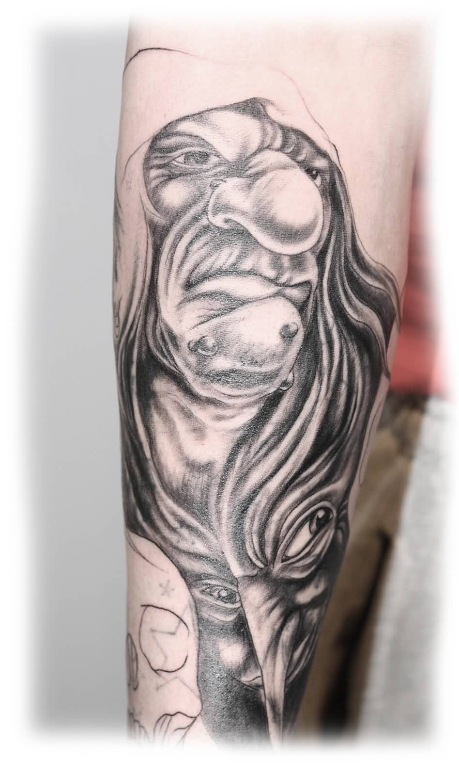 Grey Ink Goblin Tattoo On Sleeve