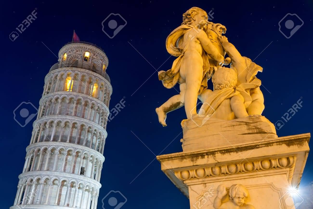 Leaning Tower Of Pisa With Statue At Night