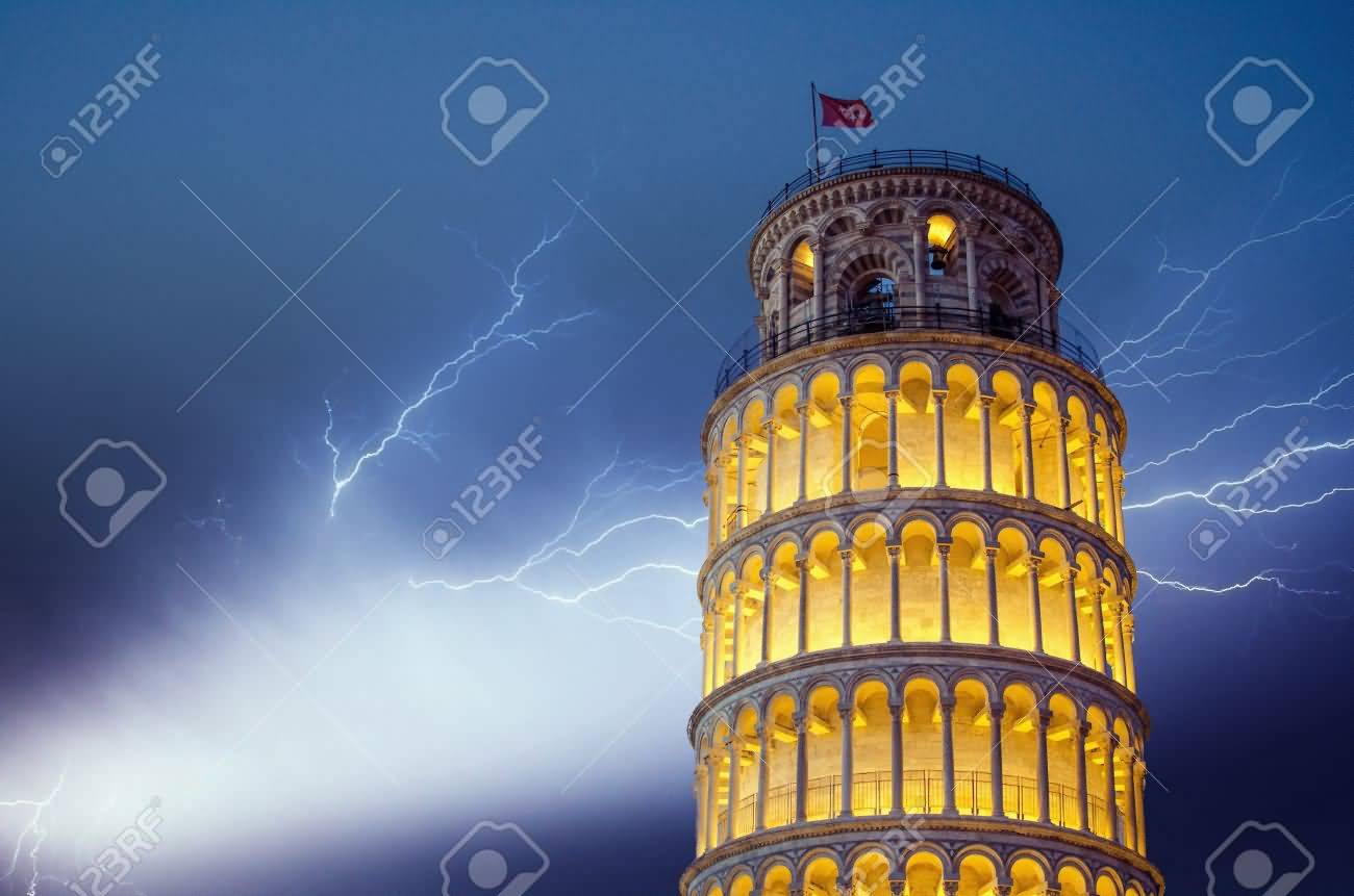 Lights And Storm Above Leaning Tower Of Pisa At Night