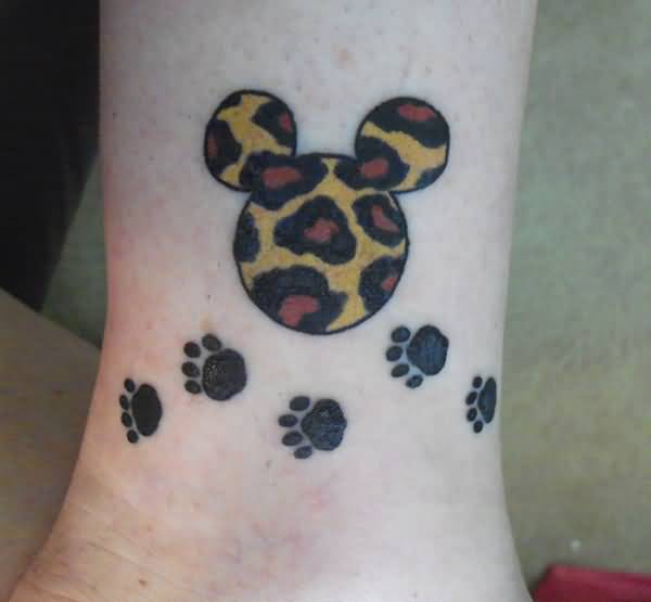 Paw Prints And Leopard Print Disney Mickey Mouse Head Tattoo On Leg