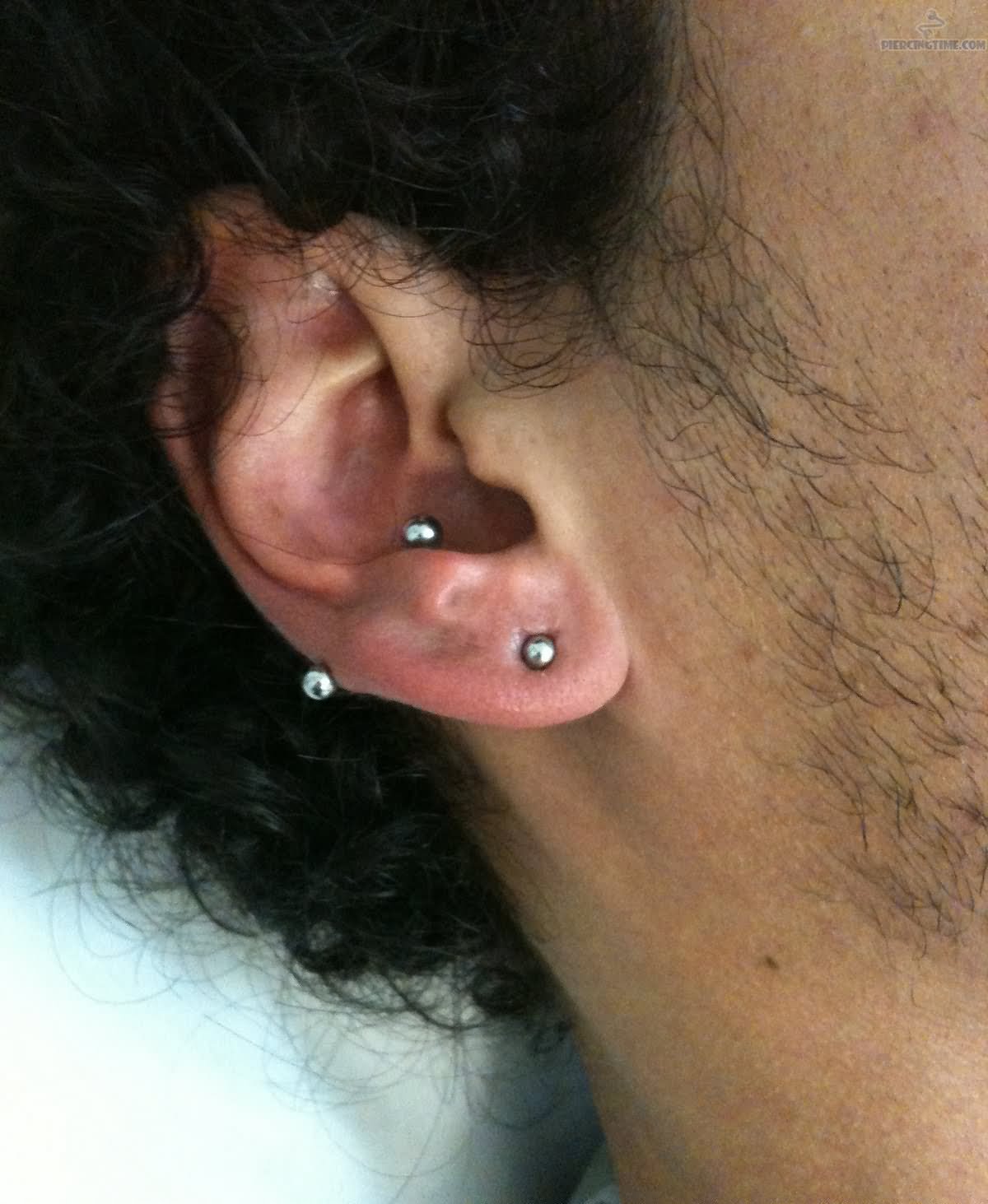 Right Ear Lobe And Inner Conch Piercing