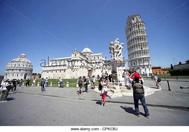 The Baptistery St. Mary Cathedral And Leaning Tower Of Pisa In Italy