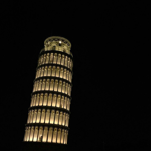 The Leaning Tower Of Pisa Lit Up At Night