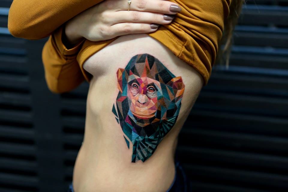 Abstract Chimpanzee Tattoo On Girl Side Rib by Mikhail Anderson