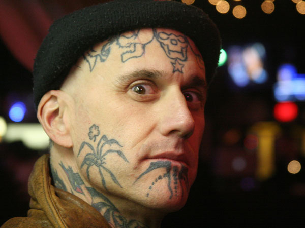 Arachnid Tattoo on Guy Face