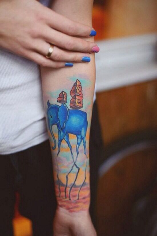 Beautiful Blue Dali Elephant Tattoo On Girl Forearm