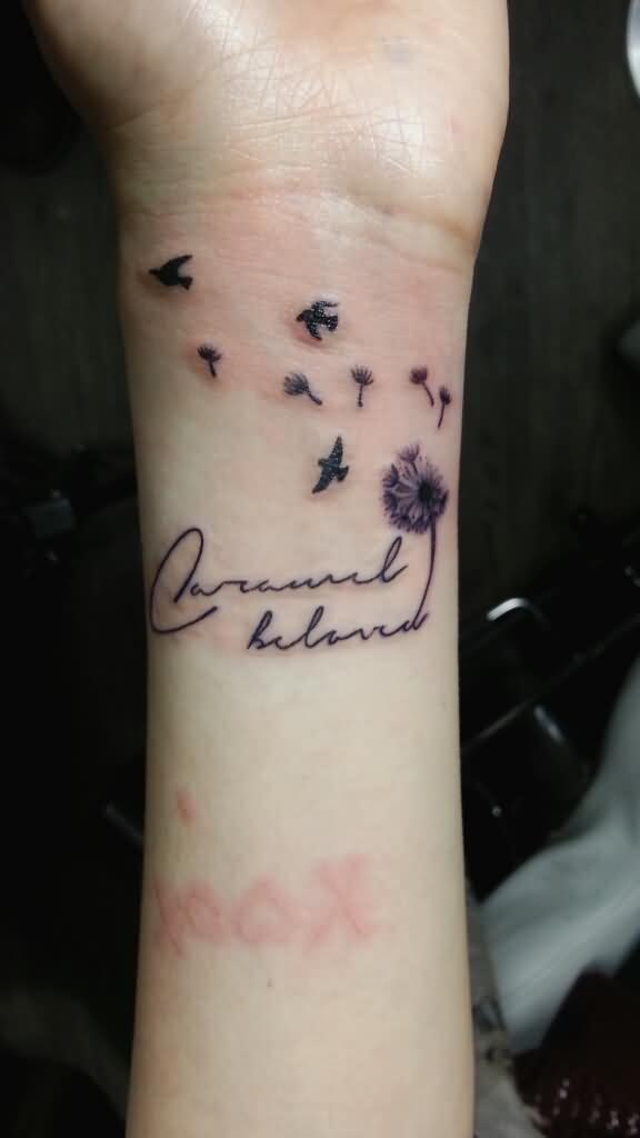 Birds Blowing From Dandelion In Black And Grey Ink Tattoo On Wrist