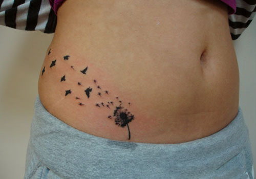 Birds Flying From Dandelion In Beautiful Shape Tattoo On Hip