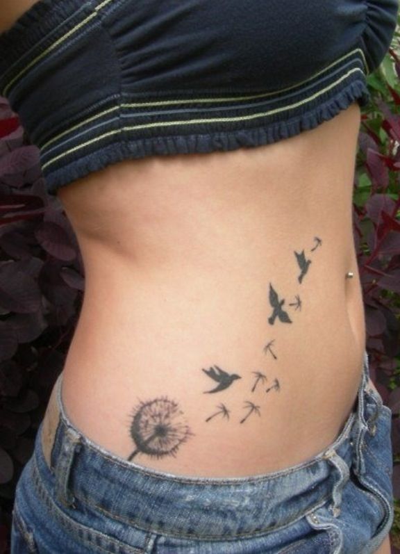 Birds Flying From Dandelion In Black And Grey Ink Tattoo On Hip