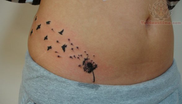 Birds Flying From Dandelion In Small Black Shape Tattoo On Right Hip