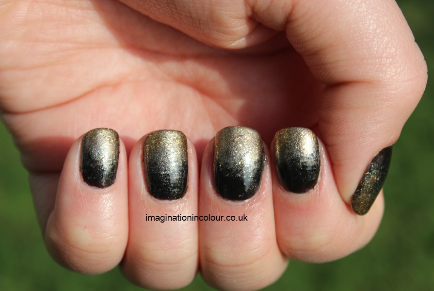 Black And Golden Glitter Ombre Nail Art