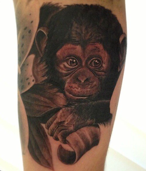 Black And Grey Ink Chimpanzee Tattoo On Leg