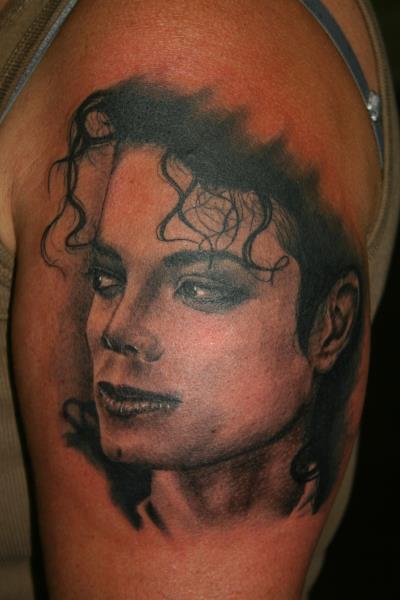 Black And Grey Michael Jackson Portrait Tattoo On Left Shoulder