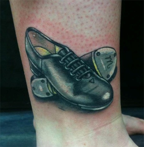 Black And Grey Shoes Tattoo On Leg