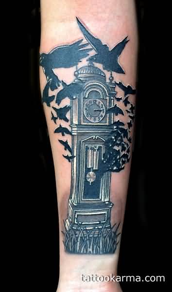 Black Crows Grandfather Clock Tattoo On Forearm