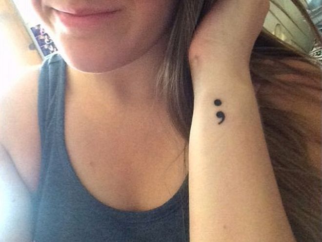 Black Ink Semicolon Tattoo On Wrist
