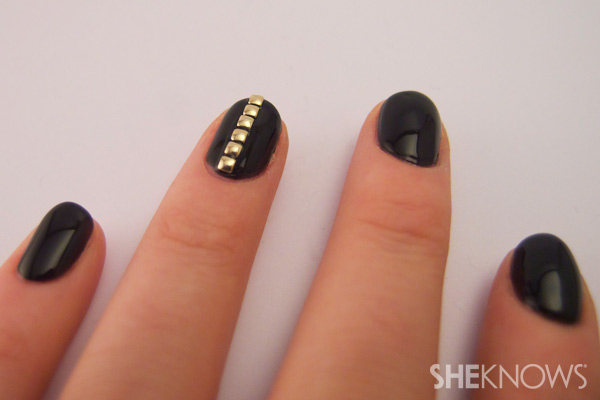 Black Nails With Gold Studs Accent Nail Art