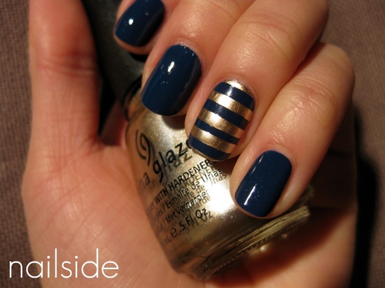 Black Nails With Golden Stripes Accent Nail Art
