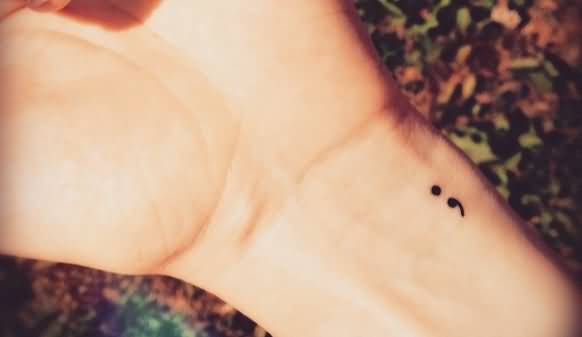 Black Semicolon Tattoo On Girl Left Wrist