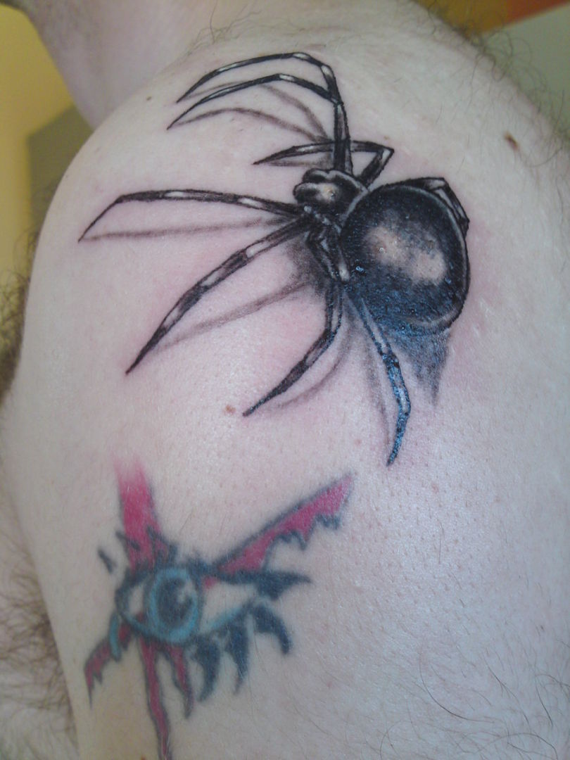 Black Widow Arachnid Tattoo On Left Shoulder