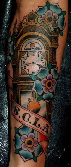 Blue Flowers And Grandfather Clock Tattoo On Arm Sleeve