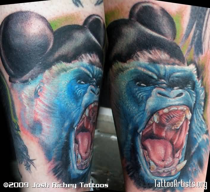 Blue Ink Angry Chimpanzee Head Tattoo