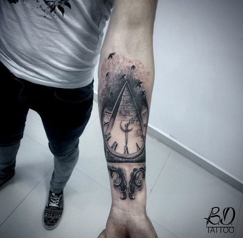 Clock Tattoo On Man Left Forearm