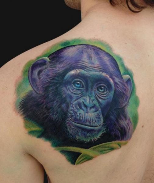 Colorful Chimpanzee Tattoo On Left Back Shoulder by Jamie Lee Parker