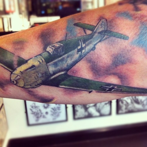 Colorful Spitfire Tattoo On Arm Sleeve