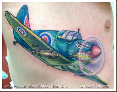Colorful Spitfire Tattoo On Side Rib by Ricky